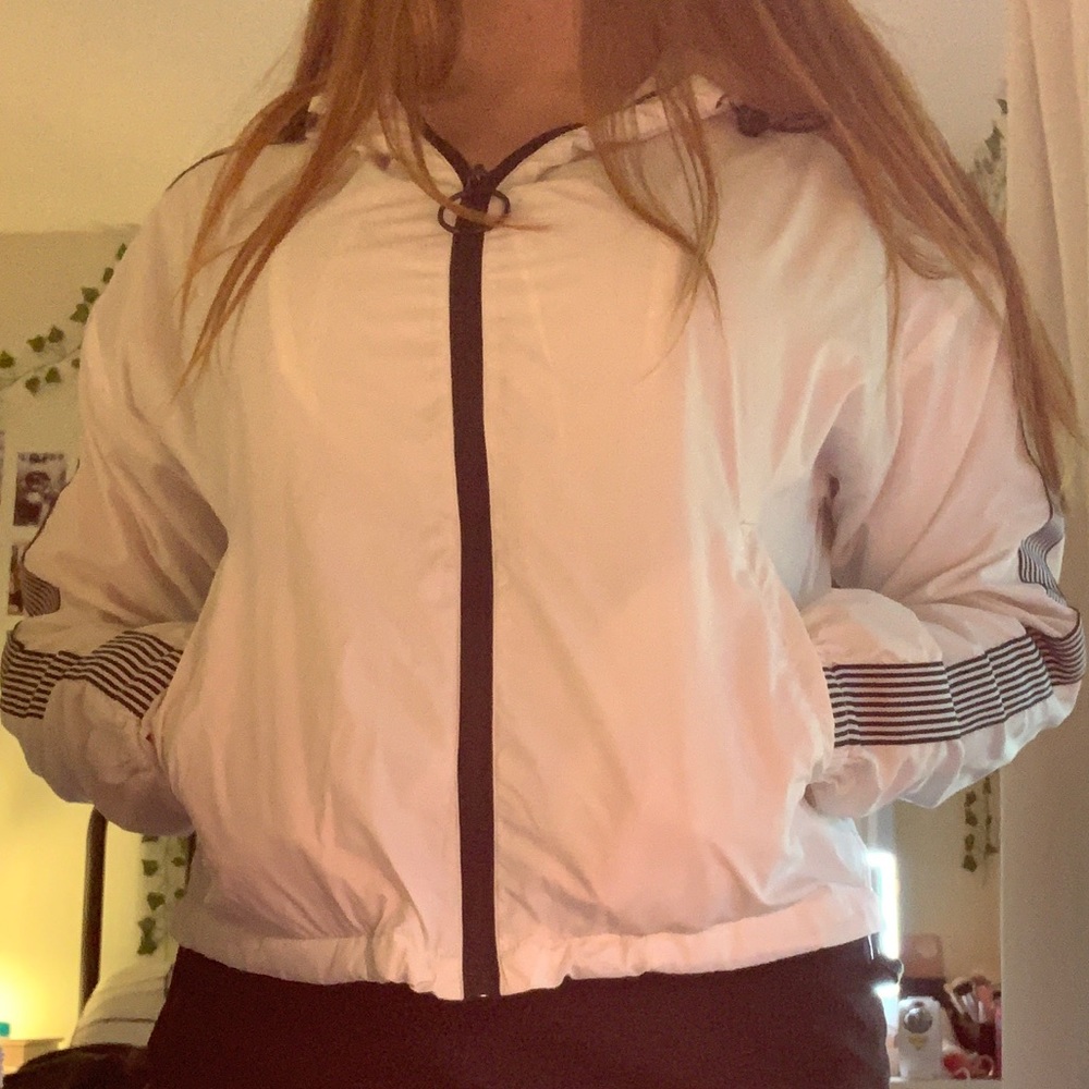 white windbreaker